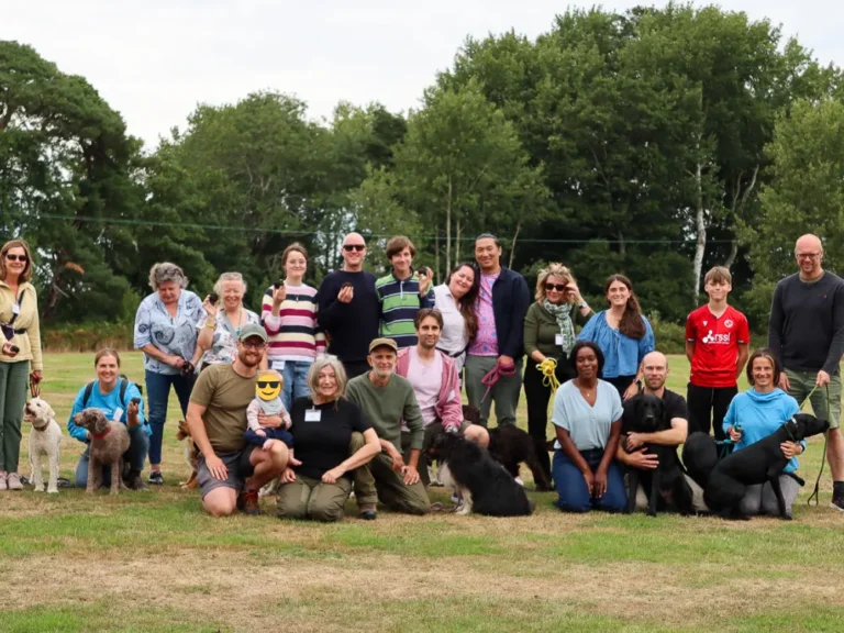 A large group of handlers and their dogs together at a Truffle Forager day
